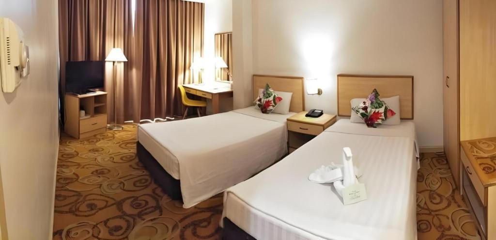 The Orchid Hotel Сибу Екстериор снимка